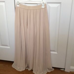 Chiffon style knee-length skirt. Never worn
